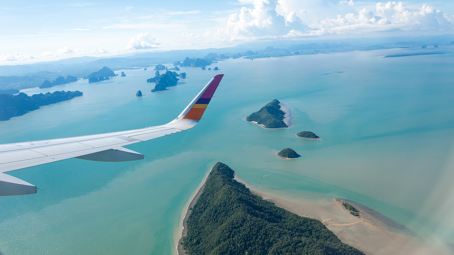 island-sea-with-plane-wing